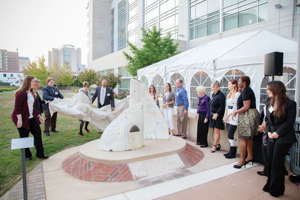 A+sculpture+using+bricks+of+the+former+Jewish+Hospital+School+of+Nursing+is+unveiled+during+a+ceremony+last+week.+Photo%3A+Kristi+Foster