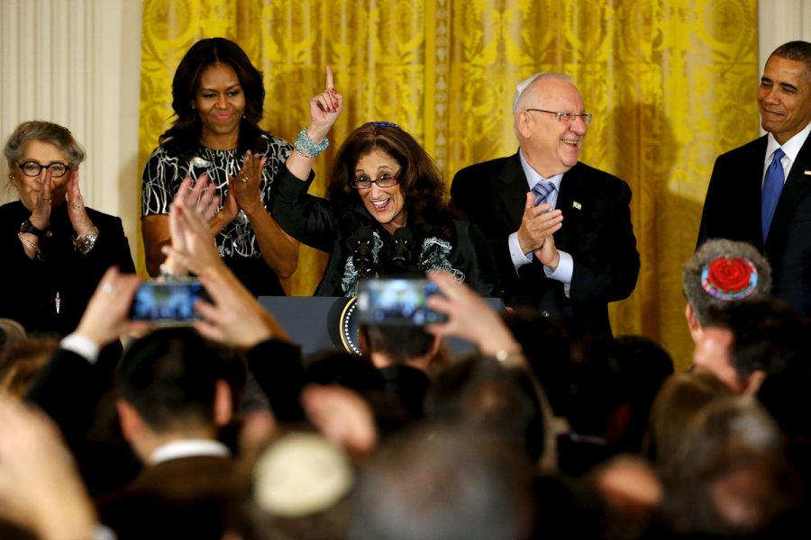 Rabbi Susan Talve (center) delivers a blessing as U.S. President Barack Obama hosts Israeli President Reuven Rivlin (second from right) and Rivlins wife Nechama Shulman Rivlin (left) for a Hanukkah reception at the White House in Washington on Dec. 9. Also pictured is U.S. first lady Michelle Obama. REUTERS/Jonathan Ernst