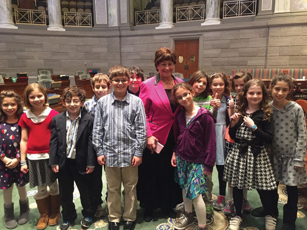 Mirowitz fourth graders are shown with State Sen. Jill Schupp on the Senate floor. The students were introduced by name during a session of Senate and invited down to the Senate floor.