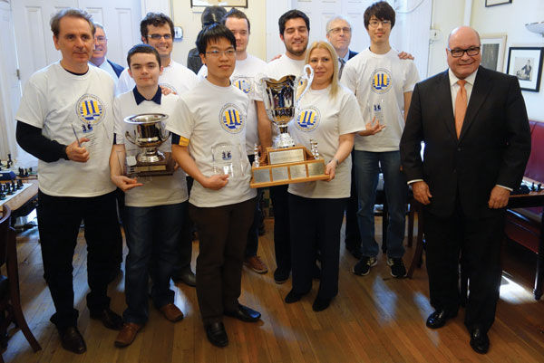 Chess Grandmaster Susan Polgar (third from right) stands with members of the Webster University chess team after it won its fourth straight Final Four victory, making it the No. 1-ranked team in the nation. Polgar, who is Jewish, has won multiple U.S. Olympic medals and Women’s World Champ-ionships.