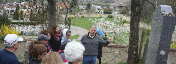 Rabbi Jim Bennett speaks to the group at the Jewish Cemetery in Mikulov, Czech Republic