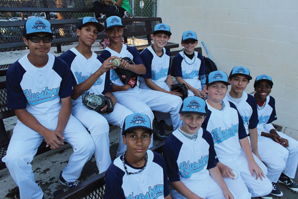 Jacob Steinmetz, back row, second from right, and his Brooklyn Bluestorm teammates are headed to the Elite World Series in Florida after going 24-0 this season. (Hillel Kuttler)