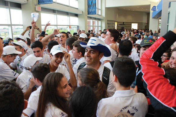 At opening ceremonies on Sunday, the Israeli dele-gation sang Jewish songs and cheered in the corridor of the Chaifetz Arena before athletes paraded onto the court.  