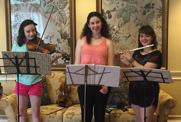 Elizabeth Bleyer (center) recruited friends Sabrina and Jillian Wolfman for her bat mitzvah project.