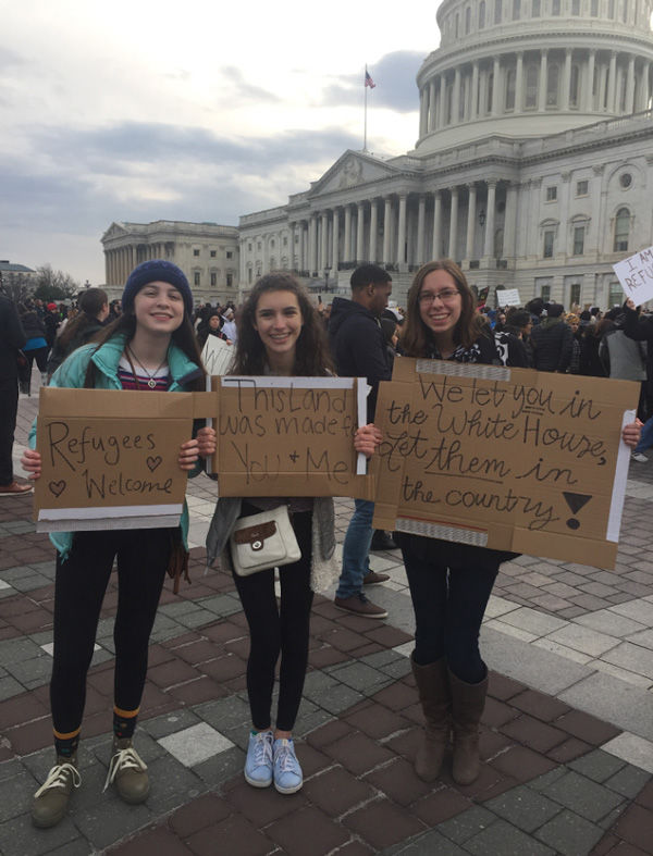 Marquette+High+School+sophomore+Lauren+Bayne+%28right%29+stands+with+friends%2C+protesting+the+Muslim+ban+at+Capitol+Hill+on+Jan.+27.+Lauren+traveled+to+Washington+D.C.+with+her+confirmation+class%2C+where+they+had+the+opportunity+to+attend+the+protest.+Photo+courtesy+of+Lauren+Bayne.