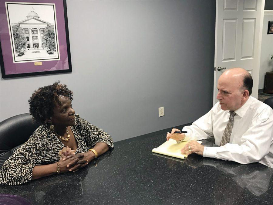 Attorney Jay Umansky meets with a client. 