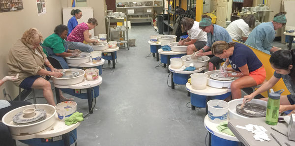 Cancer patients take pottery classes at Art Unleashed through Arts as Healing Foundation.  