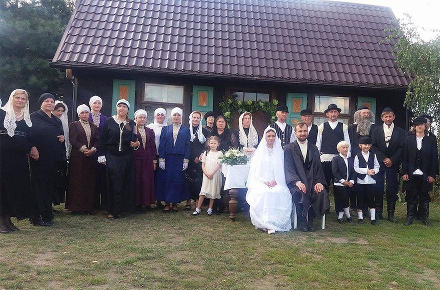 Villagers attending a fake Jewish wedding in the Polish village of Radzanow, Aug 5, 2017. (Jonny Daniels/From the Depths)