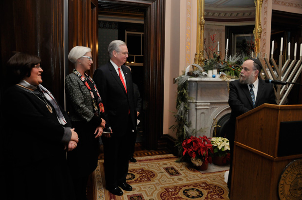 Shiffy Landa, First Lady Georganne Nixon, Governor Jay Nixon and Rabbi Yosef Landa, Chabads regional director at a 2012 Hanukkah celebration at the Governor’s Mansion, in Jefferson City on the fifth night of the holiday. Photo: Julie Smith / Chabad of Greater St. Louis  