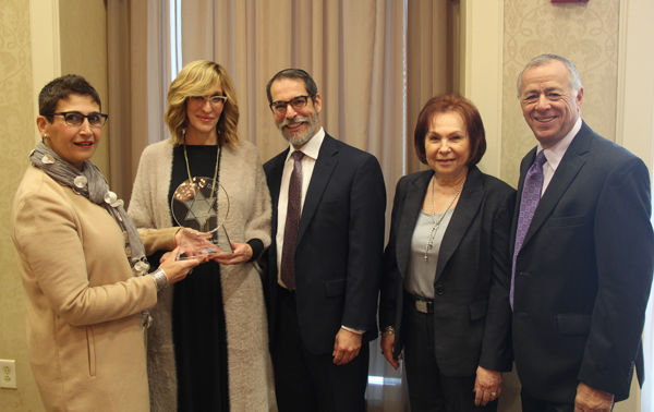 From left: Elaine Farkas, presenter of award, Selina Rovinsky, Rabbi Mike Rovinsky, Erika Greenberg and Stan Greenberg.