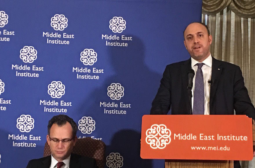 Husam Zomlot, the Palestinian Liberation Organization’s envoy to Washington, addressing the Middle East Institute in Washington, D.C., Jan. 25, 2018. Seated left is MEI Vice President Paul Salem. (Ron Kampeas)