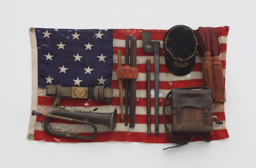 Dahn Vo’s “She was more like a beauty queen from a movie scene,” on display at the Guggenhim Museum in New York, features a 13-star American flag and musical instruments bought at auction. (Jean-Daniel Pellen, Paris/© Danh Vo)