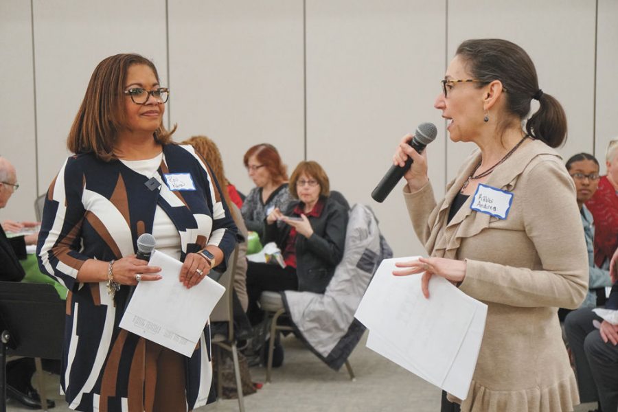 Rev. Karen Anderson of Ward Chapel AME Church and Rabbi Andrea Goldstein of Congregation Shaare Emeth take part in a Freedom Seder earlier this month at Shaare Emeth. The Freedom Seder was a joint program of the two congregations and funded by the Harvey and Leanne Schneider Interfaith Forum. Photo: Bill Motchan