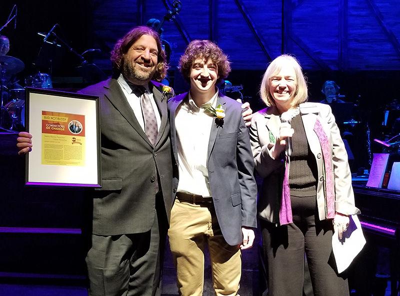 Above, Rabbi Randy Fleisher and son Gabe Fleisher were honored by Metro Theater Company as ‘Conductors of Change.’ At right is Julia Flood, artistic director of Metro Theater Company.