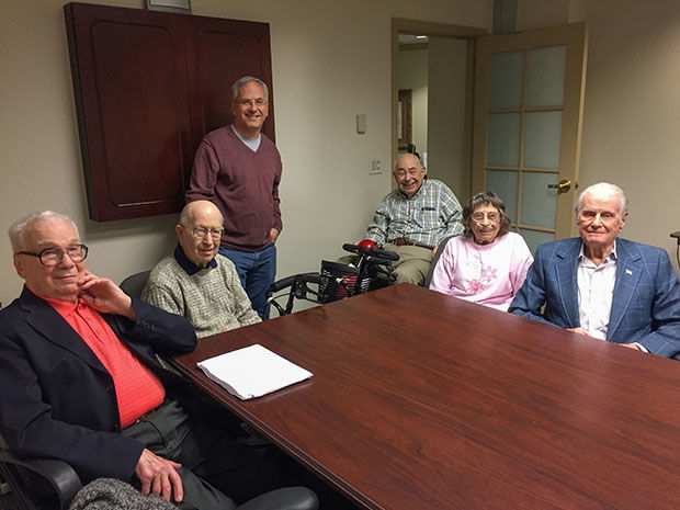 At a local senior living facility, history teacher Joe Regenbogen (standing) found 16 men and women who served during or were deeply affected by  World War II; he tells their stories in the new book ‘The Boys of Brookdale.’ Photo: Ellen Futterman