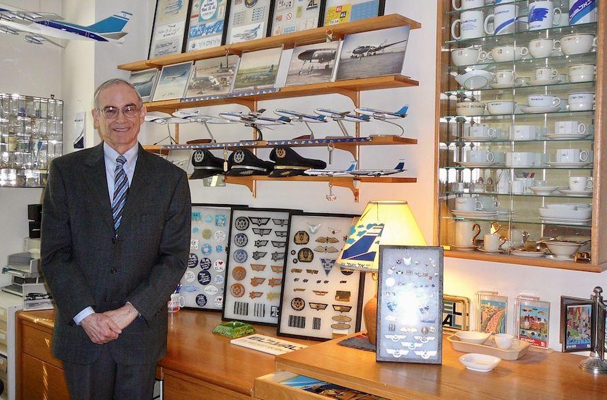 Marvin Goldman, in his New York City apartment, has created a mini museum of El Al artifacts. (Courtesy of Goldman)