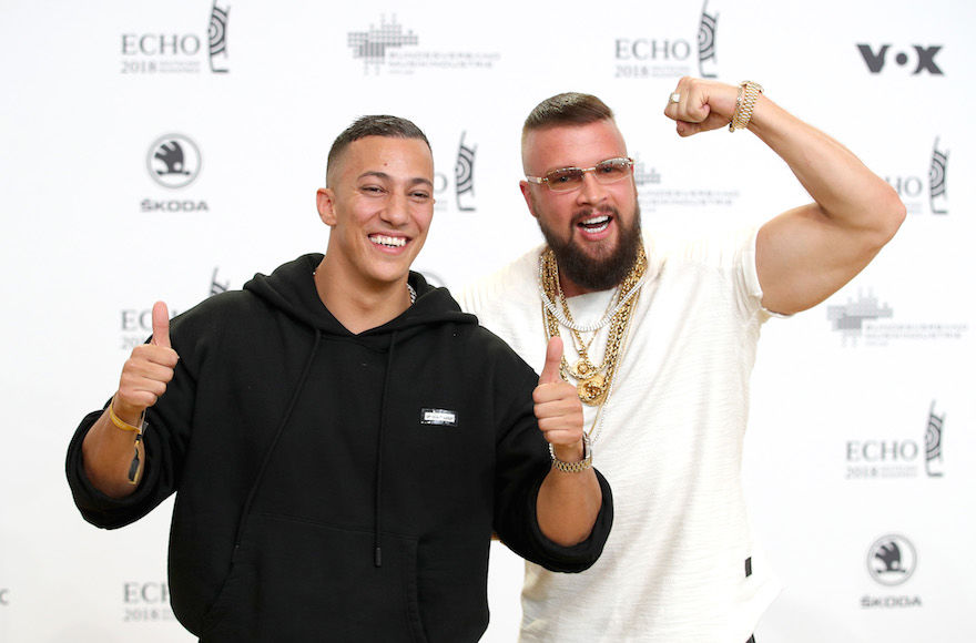 German rappers who mocked Auschwitz prisoners agree to visit Nazi camp
