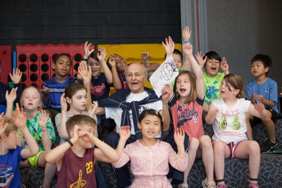 The Singing Pharmacist Marvin Cohen works with second grade students at Spoede Elementary School on May 7, rehearsing songs for a performance the following week. Cohen has been teaching American standards to teacher Jennifer Johnsons students for 20 years.