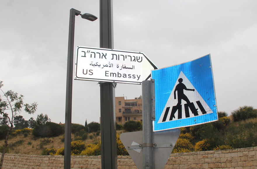 A+newly+hung+sign+pointing+to+the+U.S.+Embassy+in+Jerusalem%2C+which+was+inaugurated+on+May+14%2C+2018.+%28Ben+Sales%29