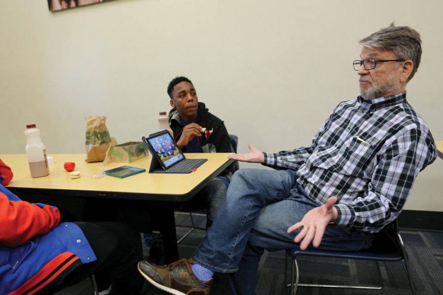 Robert Stein talks with young people at the Herbert Hoover Boys & Girls Club in April. Photo: Bill Motchan