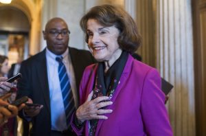 Sen. Dianne Feinstein talking with reporters in the Capitol building, June 5, 2018. 