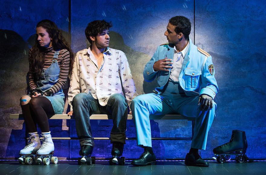 Ari’el Stachel, right, plays matchmaker to two shy Israelis, played by Rachel Prather and Etai Benson, in “The Band’s Visit.” (Matt Murphy)