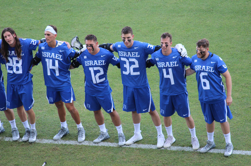 Members+of+Israel%E2%80%99s+national+lacrosse+team+sway+to+the+country%E2%80%99s+national+anthem+before+a+game+at+the+World+Lacrosse+Championships+in+Netanya%2C+Israel%2C+July+2018.+Photo%3A+Hillel+Kuttler