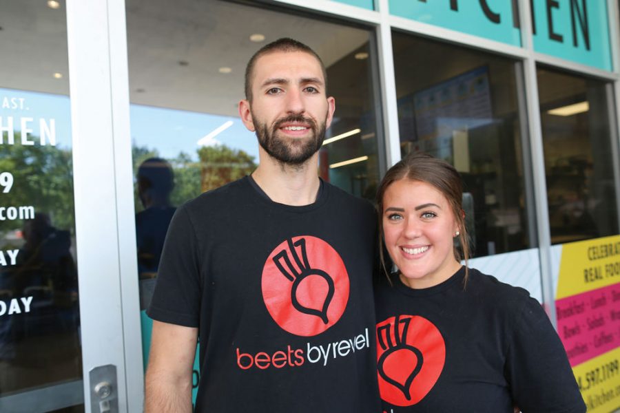 Husband and wife Simon and Angelica Lusky outside of their restaurant, Revel Kitchen. Photo: Bill Motchan