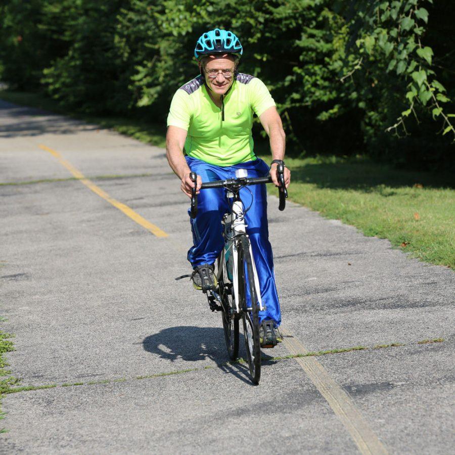 Rabbi Ze’ev Smason of Nusach Hari B’nai Zion will bike 50 miles in loops of Forest Park for the 10th annual Rabbi Ride Around fundraiser.  