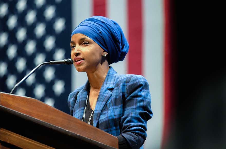 Ilhan+Omar%2C+candidate+for+U.S.+Congress%2C+speaking+at+a+Hillary+for+Minnesota+event+at+the+University+of+Minnesota%2C+October+2016.+%28Lorie+Shaull%2FFlickr%29