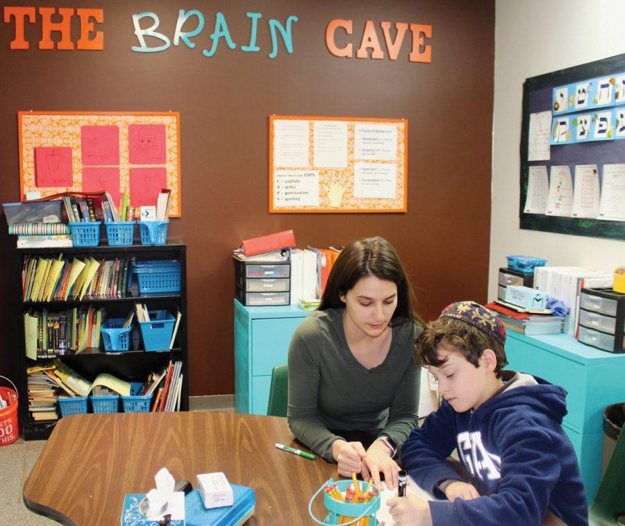 Students and learning specialists collaborate in Epstein Hebrew Academy’s “Brain Cave,” its department for student support services.