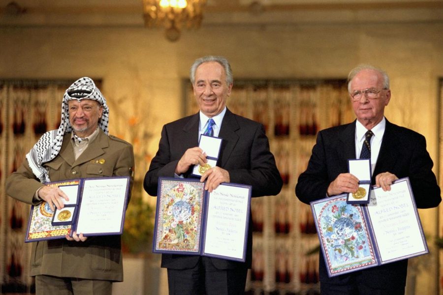 Yasser+Arafat%2C+Shimon+Peres+and+Yitzhak+Rabin+receive+the+Nobel+Peace+Prize+in+Oslo+on+Dec.+10%2C+1994.%C2%A0Photo+by+Saar+Yaacov%2C+Israels+Government+Press+Office