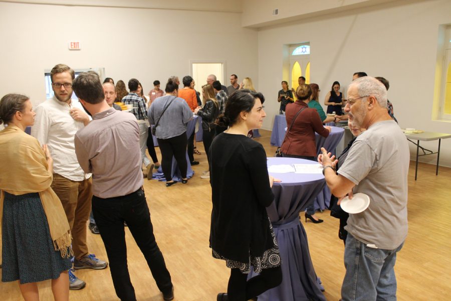Guests mingle at the opening event for MaTovu, a new Jewish center located in a former synagogue building in the Botanical Heights neighborhood in south St. Louis. Photos: Eric Berger