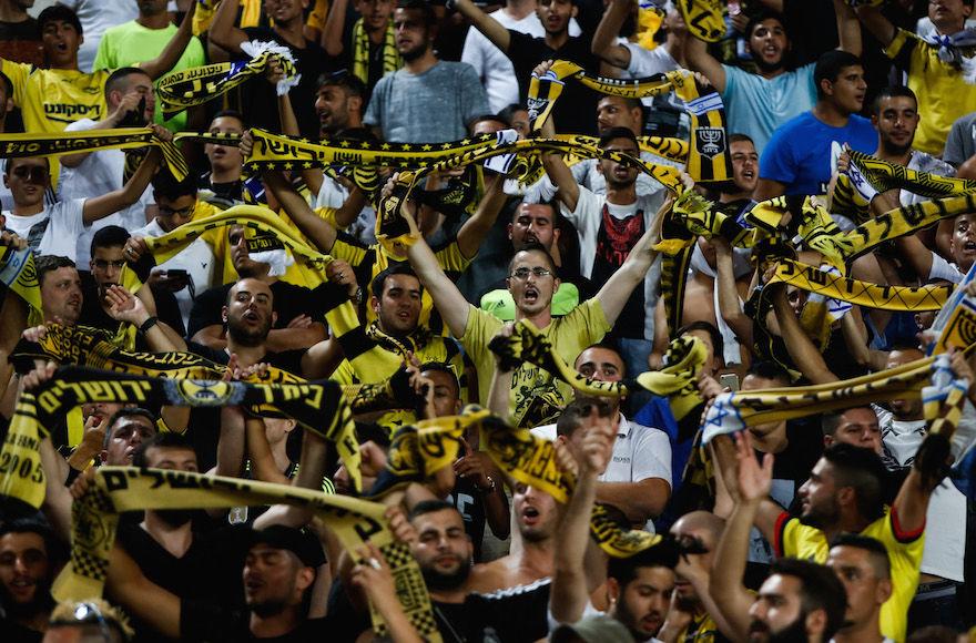 Beitar+Jerusalem+fans+cheer+during+the+UEFA+Europa+Leaguesecond+qualifying+round+second+match+between+R.+Charleroi+S.C.+and+Beitar+Jerusalem+at+the+Teddy+Stadium+in+Jerusalem+on+July+23%2C+2015.+Photo+by+Yonatan+Sindel%2FFlash90