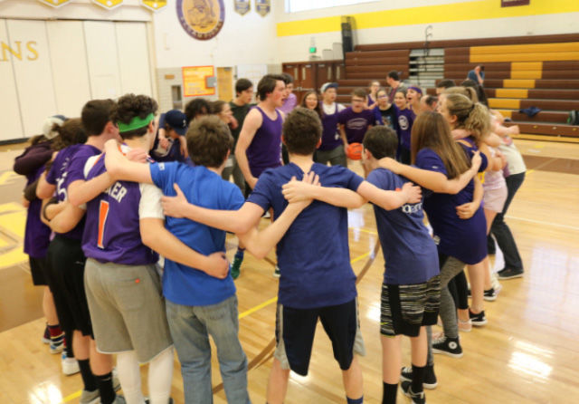 A+player+gives+a+pre-game+speech+at+the+annual+basketball+game+of+the+NFTY+convention+in+Schwayder+Camp%2C+Colo.+This+year%2C+many+Jewish+high+schoolers+had+to+choose+between+attending+their+school%E2%80%99s+homecoming+dance+or+going+to+the+NFTY+convention.