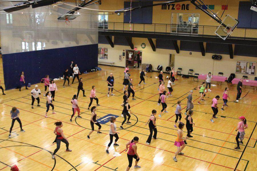 Participants work out in the Jewish Community Center gym at the 2017 ‘Pink Out at the J’ event.