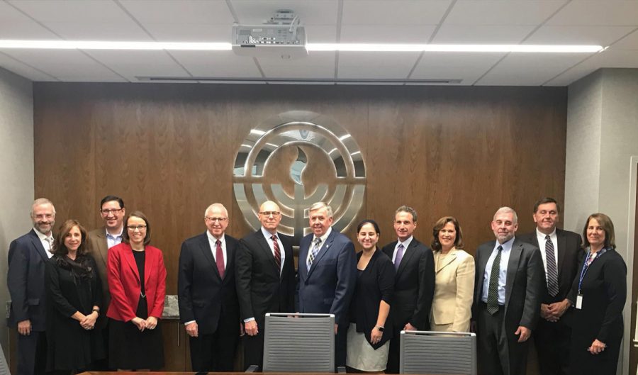 Above, from left, are Rabbi Moshe Shulman, Karen Sher, Michael Oberlander, Felicia Malter, Gerry Greiman, Andrew Rehfeld, Gov. Mike Parson, Rori Picker Neiss, John Kalishman, Lynn Wittels, Rabbi James Bennett, Don Hannon and Nancy Tully.