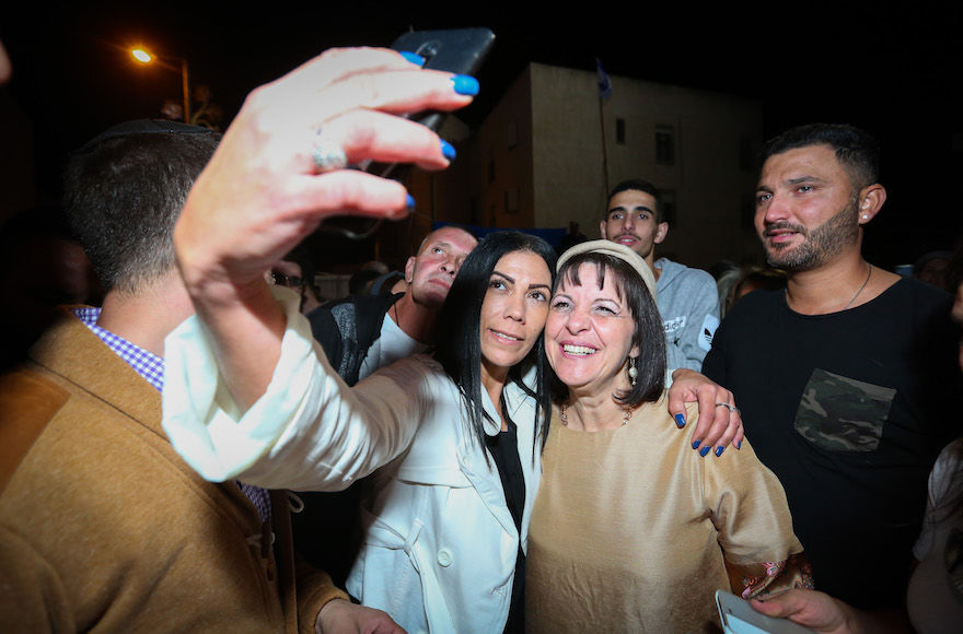 Aliza Bloch, right, in gold, celebrates with supporters after being elected mayor of Beit Shemesh, Israel, as election results are announced, Nov. 1, 2018. (Yaakov Lederman/Flash90)