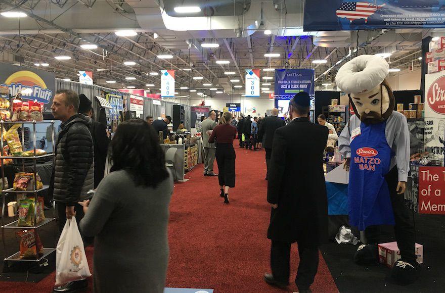 Kosherfest participants check out the products at the Meadowlands Exposition Center in Secaucus, N.J., Nov. 13, 2018. (Josefin Dolsten)