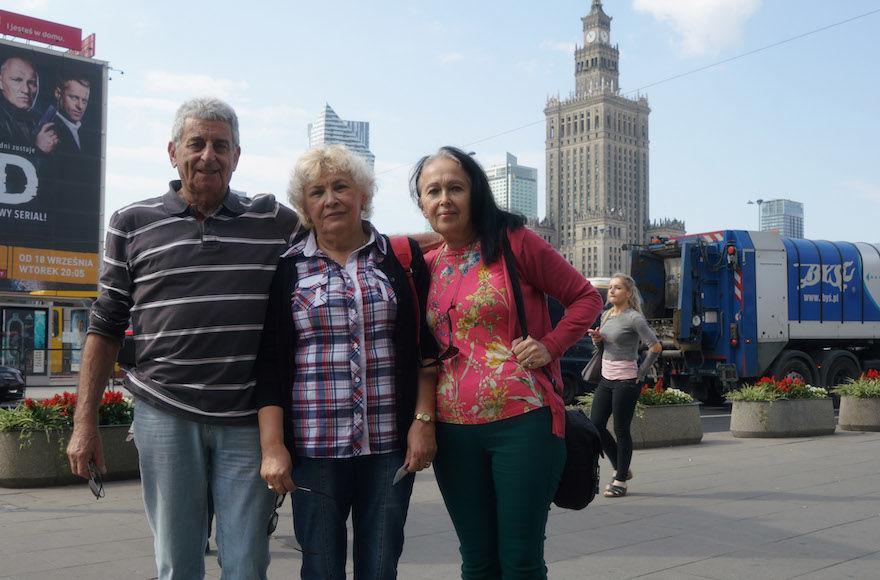 Sarah Hirsch, right, with her husband, Naftali, and friend Gabby Schwartz arriving at a Warsaw hotel, Sept. 6, 2018. Photo: Cnaan Liphshiz 