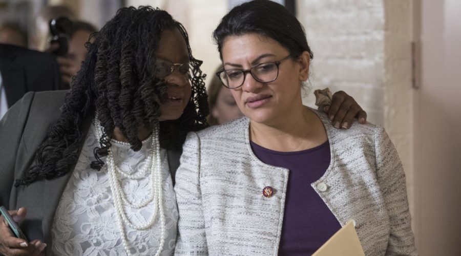 Rep. Rashida Tlaib, right, with Rep. Gwen Moore, leaves a meeting of the House Democratic Caucus in the Capitol, Jan. 4, 2019. (Photo By Tom Williams/CQ Roll Call)