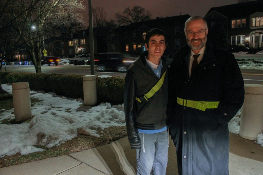 Rabbi Moshe Shulman of Young Israel of St. Louis and his son Yechiel on a Thursday night at the synagogue displayed the reflective belts that they wear on Shabbat. Photo: Eric Berger