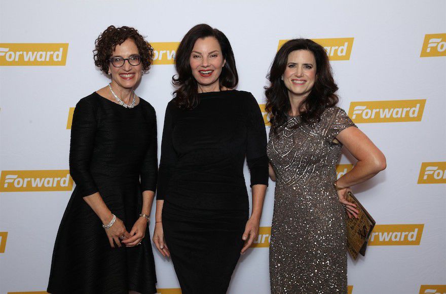 Former Forward editor-in-chief Jane Eisner, left, shown with Fran Drescher and the Forward’s CEO and publisher Rachel Fishman Feddersen, was honored at a Forward’s anniversary gala at the Museum of Jewish Heritage in New York, Nov. 13, 2017. (Jerry Lacay)