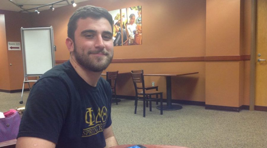 Josh Boloña, pictured sitting in his campus library, is the president of the Student Government Association at the University of Central Florida. (Ben Sales)