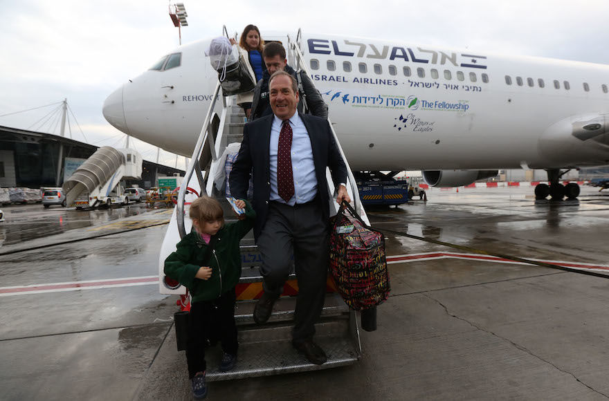Rabbi Yechiel Eckstein exits the first aliyah flight to Israel organized by the the International Fellowship of Christians and Jews, December 2014. (Courtesy of IFCJ)