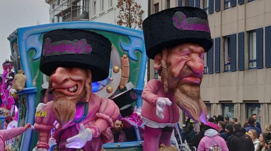 A+parade+float+at+the+Aalst+Carnaval+in+Belgium+featuring+caricatures+of+Orthodox+Jews+atop+money+bags%2C+March+3%2C+2019.+%28Courtesy+of+FJO%29