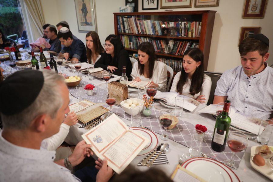 A family holds a Passover seder. Photo: Nati Shohat/Flash 90