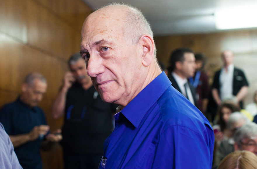 Switzerland threatened to arrest Ehud Olmert for war crimes, so he canceled his trip