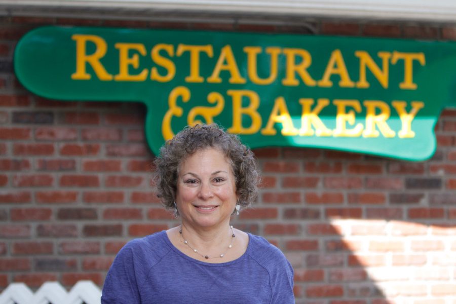 Diane+Packman+of+Creve+Coeur+started+L%2FA+Baking+and+Catering+LLC%2C+which+specializes+in+gluten-free+versions+of+classic+Jewish+baked+goods.+Here+she+is+in+front+of+an+old+restaurant+sign+hanging+in+her+home%E2%80%99s+outdoor+dining+area.+Photo%3A+Michael+Sherwin