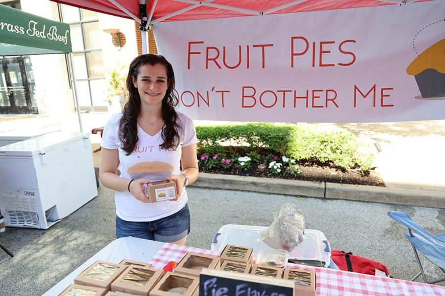 Carly Krainen sells fruit pies at the Boulevard Farmers Market. Photo: Bill Motchan 